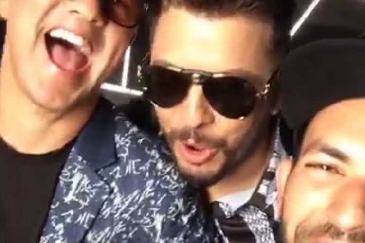 بالصور.. شاهدوا كواليس تصوير أغنية حاتم عمور وريدوان